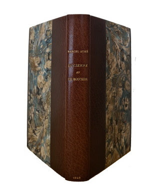 AYME (Marcel). | Lucienne et le boucher. Pièce en quatre actes.