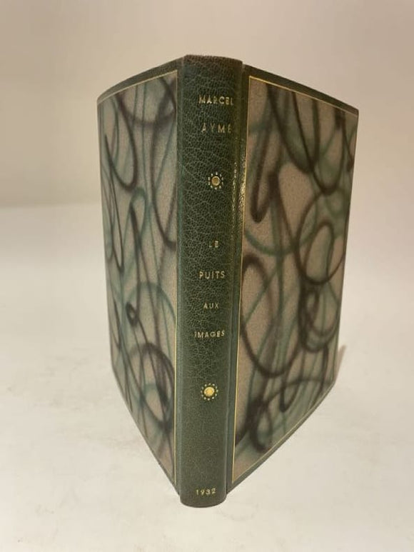 AYME (Marcel). | Le Puits aux images.