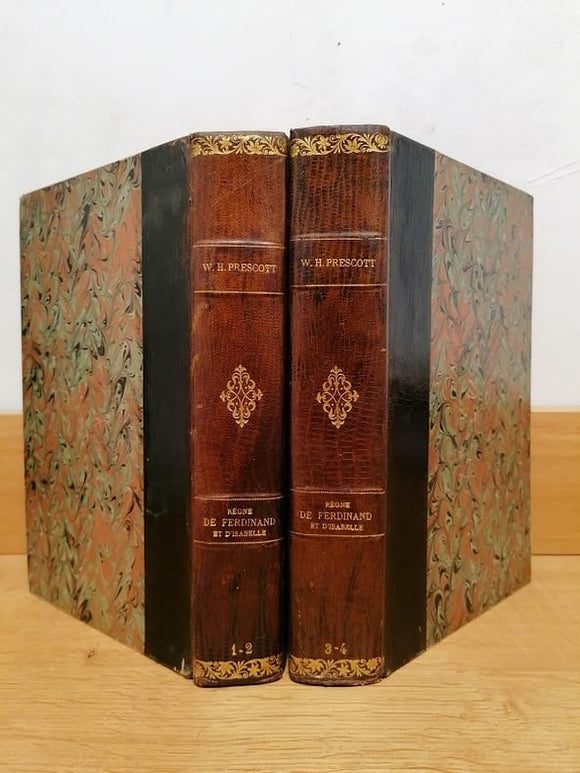 PRESCOTT (William H.). | Histoire du règne de Ferdinand et Isabelle. Tomes I à IV reliés en 2 volumes.